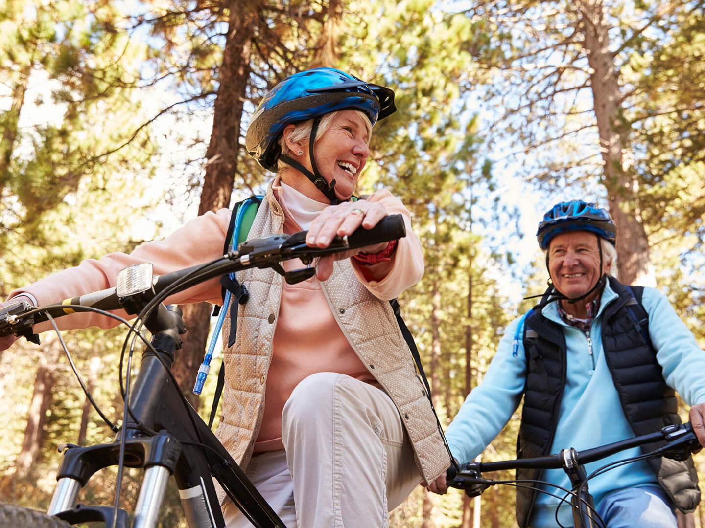 Couple riding bicycles together
